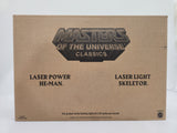 Masters of the Universe Classics Laser Power He-Man vs Laser Light Skeletor (with mailer)